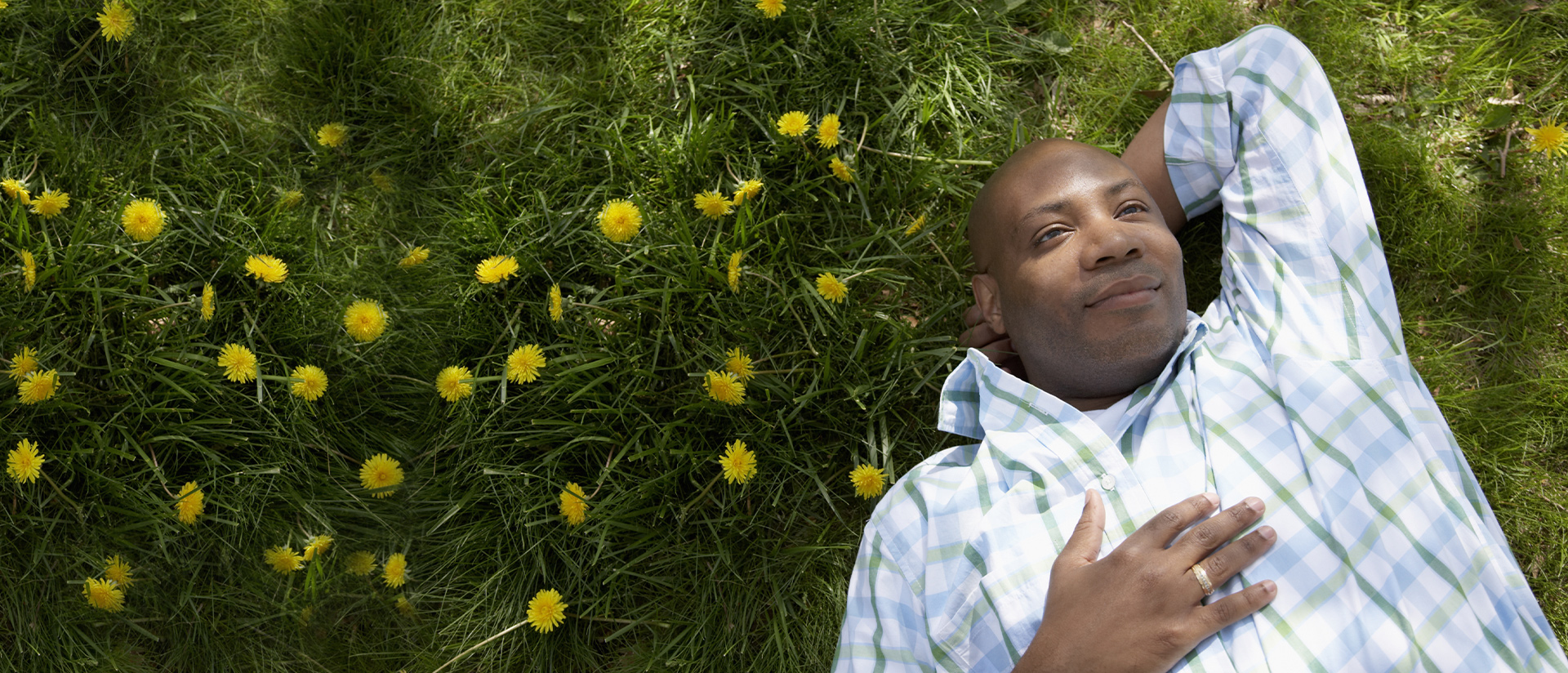 man laying on grass